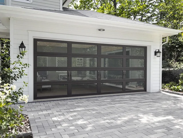 Mint Hill Garage Door Repair design specialist presenting custom garage door options to Mint Hill homeowner