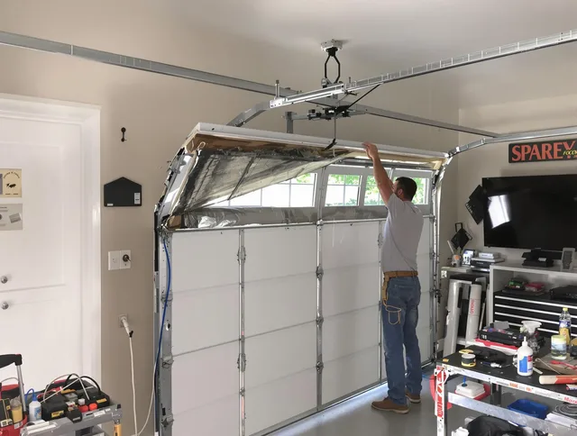 Garage door section replacement by Mint Hill Garage Door Repair in Mint Hill