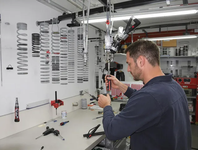 Mint Hill Garage Door Repair safety certified technician performing precision spring replacement in Mint Hill