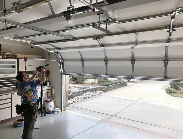 Garage door track repair service by Mint Hill Garage Door Repair in Mint Hill